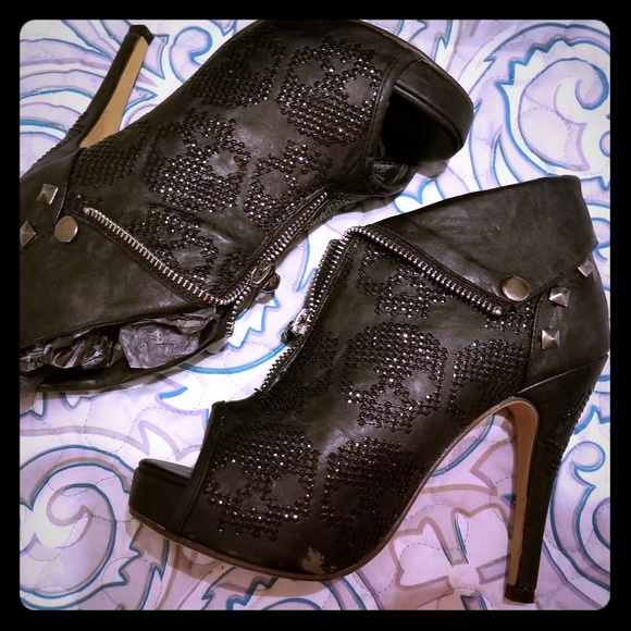 Iron Fist Shoes - Skull embossed peekaboo boots